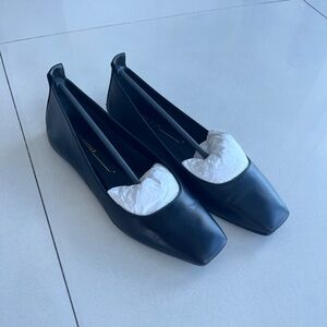 INTENTIONALLY BLANK Black Leather Flats